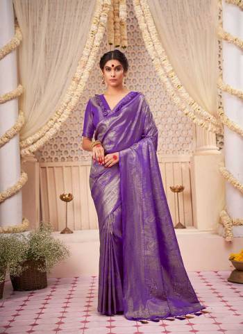 Garb These Festive Wear Saree in Fine Colored.These Saree And Blouse is Fabricated On Kanjivaram Silk.Its Beautified With Weavon Designer Work.