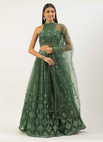 Garb This Partywear Fine Color Heavy Designer Choli Fabric Are Net And Lahenga Net And Dupatta Net In Fabricated Beautified With Attrective Sequance Embroidery Work. Buy Now.