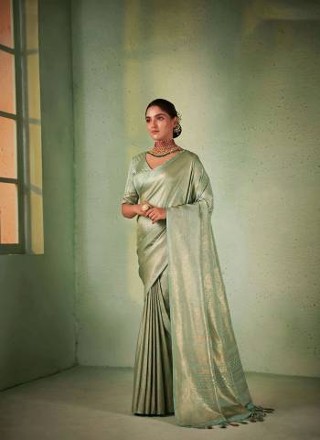 Garb These Festive Wear Saree in Fine Colored.These Saree And Blouse is Fabricated On Kanjivaram Silk.Its Beautified With Weavon Designer Work.