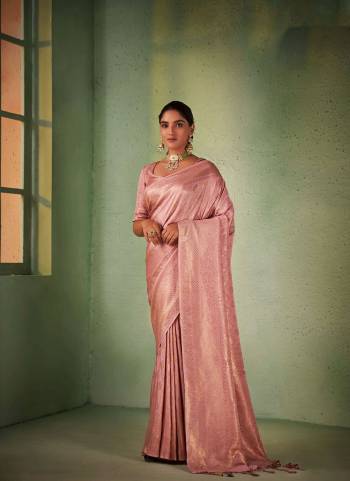 Garb These Festive Wear Saree in Fine Colored.These Saree And Blouse is Fabricated On Kanjivaram Silk.Its Beautified With Weavon Designer Work.