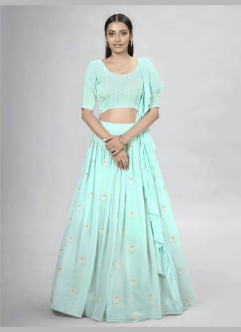 For A Designer Look,Grab These Lehenga Choli in Fine Colored.These Lehenga And Blouse Are Fabricated On Georgette Pair With Georgette Dupatta.Its Beautified With Designer Thread,Sequance Embroidery Work.