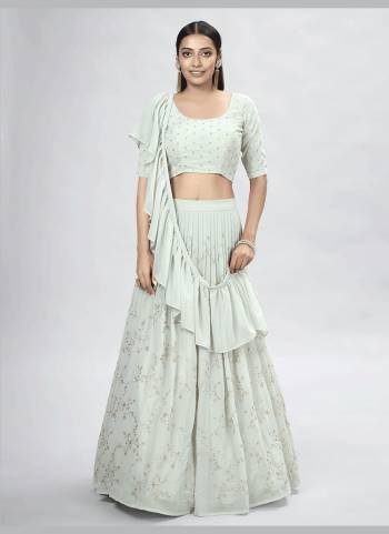 For A Designer Look,Grab These Lehenga Choli in Fine Colored.These Lehenga And Blouse Are Fabricated On Georgette Pair With Georgette Dupatta.Its Beautified With Designer Thread,Sequance Embroidery Work.