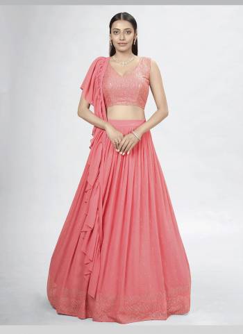 For A Designer Look,Grab These Lehenga Choli in Fine Colored.These Lehenga And Blouse Are Fabricated On Georgette Pair With Georgette Dupatta.Its Beautified With Designer Thread,Sequance Embroidery,Mukaish Work.