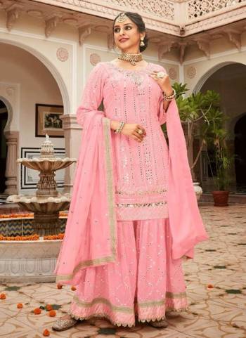 Attrective These Sharara Suit in Fine Colored Pair With Bottom And Dupatta.These Top Are Georgette And Dupatta Are Fabricated On Georgette Pair With Georgette Bottom.Its Beautified With Santoon Inner.Its Beautified With Heavy Designer Sequance Embroidery Work.