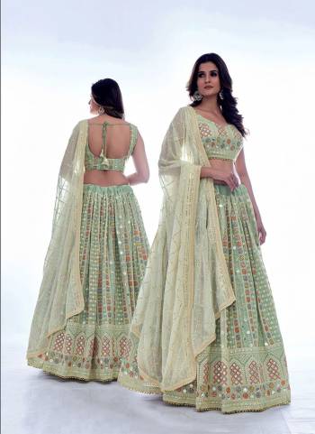 For A Designer Look,Grab These Lehenga Choli in Fine Colored.These Lehenga And Blouse Are Fabricated On Georgette Pair With Georgette Dupatta.Its Beautified With Designer Thread,Sequance Embroidery Work.