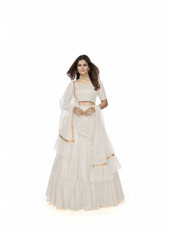 For A Designer Look,Grab These Lehenga Choli in Fine Colored.These Lehenga And Blouse Are Fabricated On Georgette Pair With Soft Net Dupatta.Its Beautified With Heavy Multy Sequance Embroidery Work.