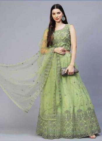 For A Designer Look,Grab These Lehenga Choli in Fine Colored.These Lehenga And Dupatta Are Fabricated On Nylon NetPair With Nylon Net Blouse.Its Beautified With Designer Embroidery Work.