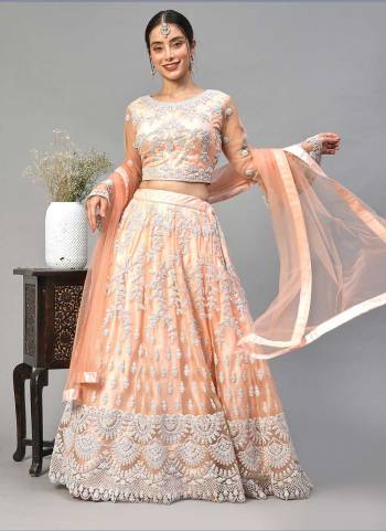 For A Designer Look,Grab These Lehenga Choli in Fine Colored.These Lehenga And Dupatta Are Fabricated On Nylon NetPair With Nylon Net Blouse.Its Beautified With Designer Embroidery Work.