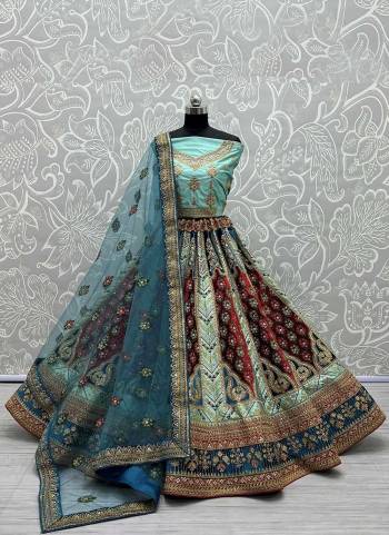 For A Designer Look,Grab These Lehenga Choli in Fine Colored.These Lehenga Choli Are Matka Silk And Dupatta Are Fabricated On Soft Net Pair.Its Beautified With Fancy Designer Multy Thread,Dori Embroidery Work.