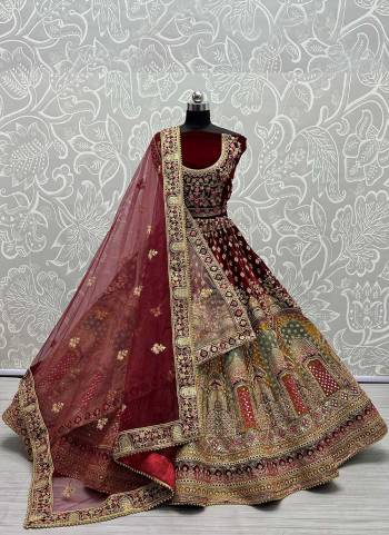 For A Designer Look,Grab These Lehenga Choli in Fine Colored.These Lehenga Choli Are Velvet And Dupatta Are Fabricated On Soft Net Pair.Its Beautified With Fancy Designer Multy Thread,Dori,Sequace Embroidery,Hand Mirror Work.