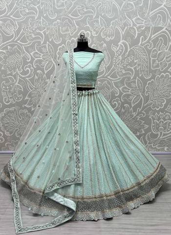 For A Designer Look,Grab These Lehenga Choli in Fine Colored.These Lehenga Choli Are Georgette And Dupatta Are Fabricated On Soft Net Pair.Its Beautified With Fancy Designer Multy Thread,Sequance,Dori Embroidery,Zarkan Work.