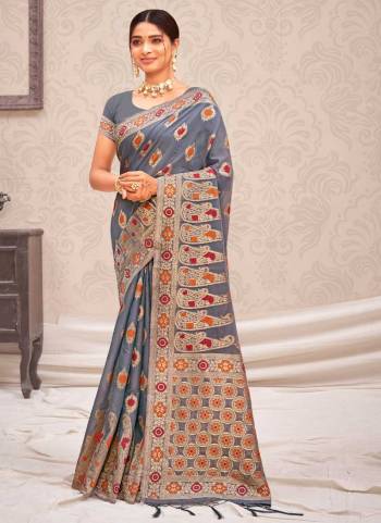 Grab These Party Wear Saree in Fine Colored.These Saree And Blouse is Fabricated On Cotton Silk.Its Beautified With Weavon Designer Work.