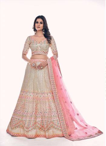 For A Designer Look,Grab These Lehenga Choli in Fine Colored.These Lehenga And Blouse Are Fabricated On Soft Net Pair With Soft Net Dupatta.Its Beautified With Designer Dori,Thread,Sequance Embroidery,Zarkan Work.