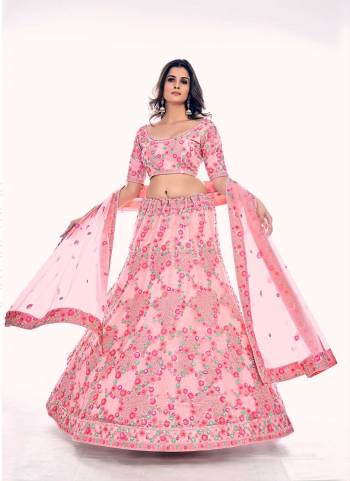 For A Designer Look,Grab These Lehenga Choli in Fine Colored.These Lehenga And Blouse Are Fabricated On Soft Net Pair With Soft Net Dupatta.Its Beautified With Designer Dori,Thread,Sequance Embroidery,Zarkan Work.