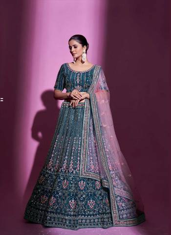 For A Designer Look,Grab These Lehenga Choli in Fine Colored.These Lehenga And Blouse Are Fabricated On Crepe Pair With Soft Net Dupatta.Its Beautified With Designer Heavy Embroidery Work.