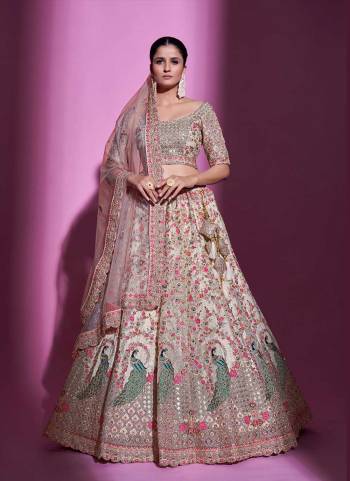 For A Designer Look,Grab These Lehenga Choli in Fine Colored.These Lehenga And Blouse Are Fabricated On Soft Net Pair With Soft Net Dupatta.Its Beautified With Designer Heavy Embroidery Work.