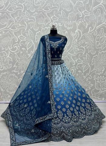 For A Designer Look,Grab These Lehenga Choli in Fine Colored.These Lehenga Are Net Choli Are Bridal Net And Dupatta Are Fabricated On Soft Net Pair.Its Beautified With Fancy Designer Mirror,Dori Embroidery,Zarkan Diamond Work.