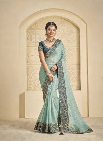 Look Attrective These Party Wear Saree in Fine Colored.These Saree Are Patterned Organza And Blouse  is Fabricated On Raw Silk.Its Beautified With Heavy Designer Thread Embroidery Work.