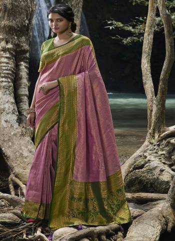 Attrective These Party Wear Saree in Fine Colored.These Saree And Blouse is Fabricated On Kanjivarm Silk.Its Beautified With Heavy Weaving Designer.