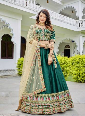 For A Designer Look,Grab These Lehenga Choli in Fine Colored.These Lehenga And Blouse Are Fabricated On Ferrari Silk Pair With Butterfly Net Dupatta.Its Beautified With Designer Multy Thread,Sequance Embroidery Work.