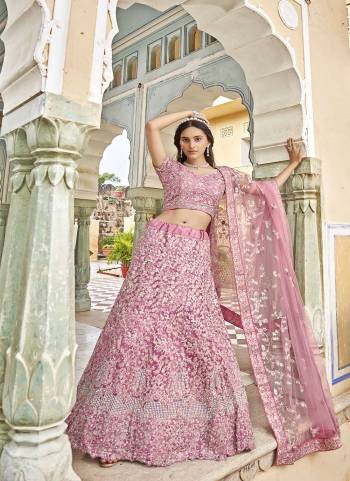 Attrective Looking These Partywear Lehenga Choli in Fine Colored Pair With Dupatta.These Blouse And Dupatta Net Are Fabricated On Net Pair Lehenga.Its Beautified With Heavy Designer Embroidery With Zarkan Diamond Work.