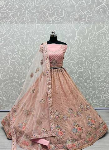 For A Designer Look,Grab These Lehenga Choli in Fine Colored.These Lehenga Choli Are Bridal Net And Dupatta Are Fabricated On Soft Net Pair.Its Beautified With Fancy Designer Multy Thread,Dori,Sequance Embroidery Work.