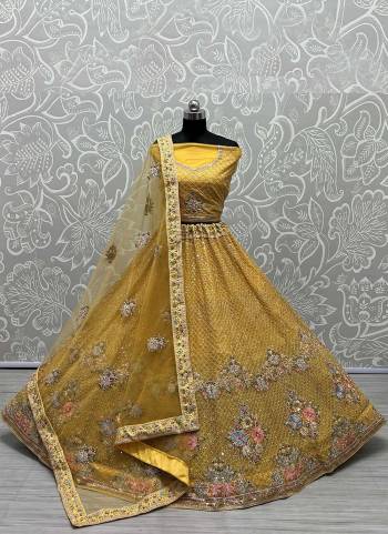 For A Designer Look,Grab These Lehenga Choli in Fine Colored.These Lehenga Choli Are Bridal Net And Dupatta Are Fabricated On Soft Net Pair.Its Beautified With Fancy Designer Multy Thread,Dori,Sequance Embroidery Work.