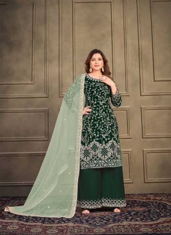 Grab These Plazzo Suit in Fine Colored Pair With Bottom And Dupatta.These Top Are Velvet And Dupatta Are Fabricated On Net Pair With Santoon Bottom.Its Beautified With Santoon Inner.Its Beautified With Heavy Designer Embroidery Work.