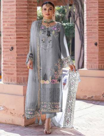 Attrective These Designer Suit in Fine Colored Pair With Bottom And Dupatta.These Top Are Faux Georgette And Dupatta Are Fabricated On Nazneen Pair With Santoon Bottom.Its Beautified With Santoon Inner.Its Beautified With Heavy Designer Embroidery Work.