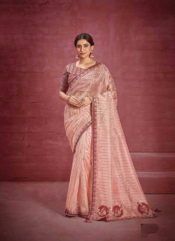 Look Attrective These Party Wear Saree in Fine Colored.These Saree Are Patterned Jacquard Organza And Blouse  is Fabricated On Raw Silk.Its Beautified With Heavy Designer Embroidery Work.