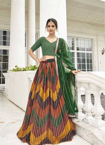 Attrective Looking These Partywear Lehenga Choli in Fine Colored Pair With Dupatta.These Blouse Are Banglori Silk And Dupatta Net Are Fabricated On Georgette Pair Lehenga.Its Beautified With Digital Printed With Designer Thread, Sequance Embroidery Work.