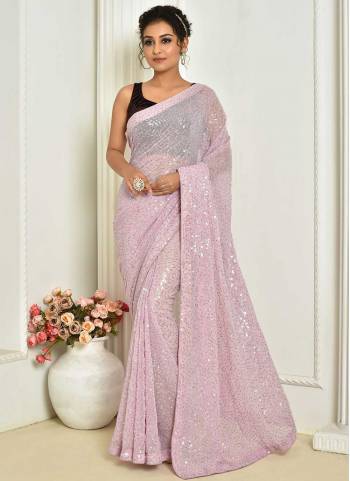 Attrective Look These Saree in Fine Colored.These Saree Are Georgette And Blouse is Art Silk Fabricated.Its Beautified With Designer Sequance Embroidery Work.