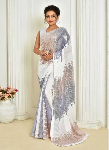 Attrective Look These Saree in Fine Colored.These Saree Are Georgette And Blouse is Art Silk Fabricated.Its Beautified With Designer Sequance Embroidery Work.