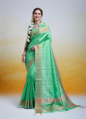 Garb These Festive Wear Saree in Fine Colored.These Saree And Blouse is Fabricated On Tussar Silk.Its Beautified With Weavon Butti Designer.