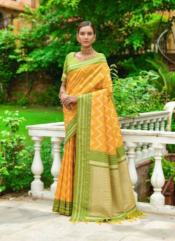 Garb These Party Wear Saree in Fine Colored.These Saree And Blouse is Fabricated On Raw Silk Two Tone.Its Beautified With Contrast Weavon Designer.