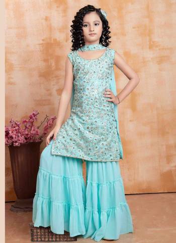 For A Designer Look,Grab These Kidswear Readymade Sharara Suits in Fine Colored.These Top And Bottom Are Fabricated On Faux Georgette Pair With Faux Georgette Dupatta.Its Beautified With Designer Sequance Embroidery Work.