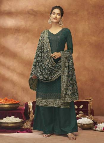 Attrective Looking These Plazzo Suit in Fine Colored Pair With Bottom And Dupatta.These Top And Dupatta Are Fabricated On Georgette Pair With Santoon Bottom.Its Beautified With Santoon Inner.Its Beautified With Heavy Designer Embroidery With Masin Diamond Work.