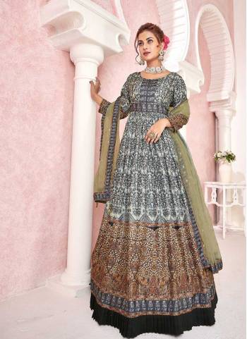 For A Designer Look,Grab These Readymade Gown With Dupatta in Fine Colored.These Gown Are Fabricated On Dola Silk Pair With Net Dupatta.Its Beautified With Designer Digital Printed With Sequance Embroidery Work.