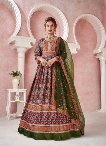 For A Designer Look,Grab These Readymade Gown With Dupatta in Fine Colored.These Gown Are Fabricated On Dola Silk Pair With Net Dupatta.Its Beautified With Designer Digital Printed With Sequance Embroidery Work.