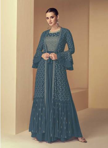 Attrective These Designer Suit in Fine Colored Pair With Bottom And Jacket.These Top Are Faux Georgette And Jacket And Bottom Are Fabricated On Faux Georgette Pair With Santoon Inner.Its Beautified With Heavy Designer Embroidery Work.