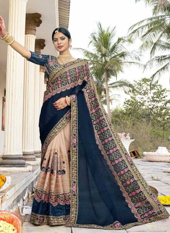 Garb These Designer Half Half Saree in Fine Colored.These Saree And Blouse is Fabricated On Fancy Art Silk Pair.Its Beautified With Blooming Color,Heavy Embroidery,Diamond Work.