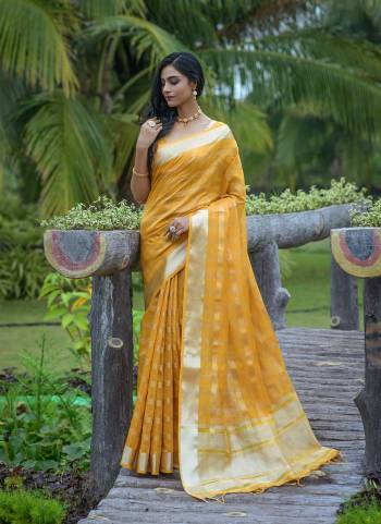 Attrective These Festive Wear Saree in Fine Colored.These Saree And Blouse is Fabricated On Organza.Its Beautified With Weavon Jari Checks Designer.