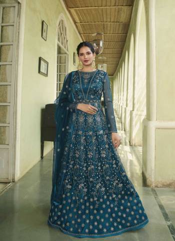 Garb These Party Wear Suit in Fine Colored Pair With Bottom And Dupatta.These Top And Dupatta Are Fabricated On Butterfly Net Pair With Satin Bottom.Its Beautified With Satin Inner.Its Beautified With Heavy Designer Embroidery Work.