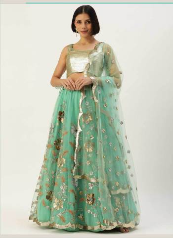 Garb This Partywear Fine Color Heavy Designer Choli Fabric Are Silk And Lahenga Net And Dupatta Net In Fabricated Beautified With Attrective Thread,Sequance Embroidery Work. Buy Now.