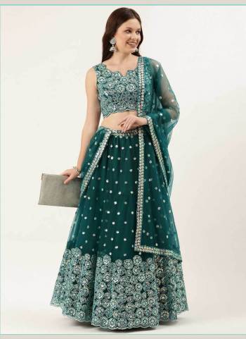 Garb This Partywear Fine Color Heavy Designer Choli Fabric Are Net And Lahenga Net And Dupatta Net In Fabricated Beautified With Attrective Thread,Sequance Embroidery Work. Buy Now.