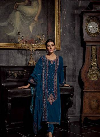 Attrective These Designer Suit in Fine Colored Pair With Bottom And Dupatta.These Top And Dupatta Are Fabricated On Velvet Pair With Velvet Bottom.Its Beautified With Heavy Designer Embroidery Work.