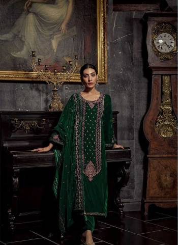 Attrective These Designer Suit in Fine Colored Pair With Bottom And Dupatta.These Top And Dupatta Are Fabricated On Velvet Pair With Velvet Bottom.Its Beautified With Heavy Designer Embroidery Work.