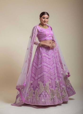 For A Designer Look,Grab These Lehenga Choli in Fine Colored.These Lehenga Choli Are Bridal Net And Dupatta Are Fabricated On Soft Net Pair.Its Beautified With Fancy Designer Multy Thread,Sequance Embroidery Work.