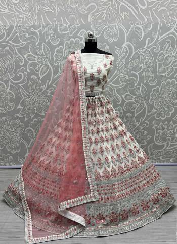 For A Designer Look,Grab These Lehenga Choli in Fine Colored.These Lehenga Choli Are Georgette And Dupatta Are Fabricated On Soft Net Pair.Its Beautified With Fancy Designer Multy,Dori Embroidery,Zarkan Work.