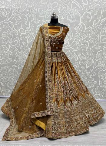 For A Designer Look,Grab These Lehenga Choli in Fine Colored.These Lehenga Choli Are Velvet And Dupatta Are Fabricated On Soft Net Pair.Its Beautified With Fancy Designer Multy,Dori Embroidery,Diamond Work.